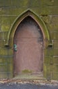 Metal door to an old crypt Royalty Free Stock Photo