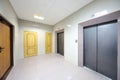 Metal doors to elevators and offices