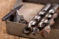Metal drill bits and locksmith accessories. Accessories in a home workshop