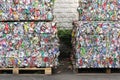 Metal drink cans from soft drinks squashed for recycling