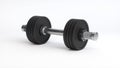 Metal Dumbbell With Black Discs on a Soft White Studio Background. Sport concept. Royalty Free Stock Photo