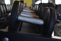 Metal dumbbells in a row in gym