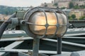 Metal encased glowing lamp