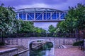 Metal enclosed walkway bridge in Big Spring International Park Huntsville, Alabama