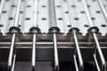 Metal equipment for drying dishes on professional kitchen. Selective focus. Shallow depth of field