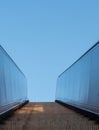 Metal escalator outdoors with blue sky Royalty Free Stock Photo