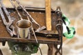 A metal fabricator utilizing a torch to heat up a piece of metal in order to shape it utilizing a forging technique