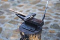A metal fabricator utilizing a torch to heat up a piece of metal in order to shape it utilizing a forging technique