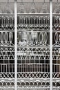 Metal facade element. Window of medieval castle or fortress interior. Church, cathedral or temple exterior element