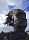 Metal face sculpture