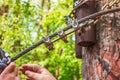 Metal fastenings on bolts on a cable Royalty Free Stock Photo