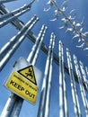 A metal fence keeping trespassers out with a warning sign stating danger of death