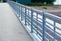 Metal fence on the embankment