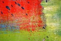 Metal fence with red,green,blue,white and black paint Royalty Free Stock Photo