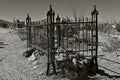 Metal fence around a gravesite at boothill