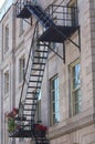 Metal fire emergency exit stairs outside an old style building Royalty Free Stock Photo