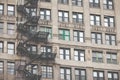 Metal fire escape outside apartment building for emergency Royalty Free Stock Photo