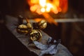 A metal forged rose lies on the pier in the smithy Royalty Free Stock Photo