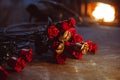 A metal forged rose lies on the pier in the smithy Royalty Free Stock Photo