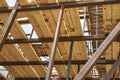 Metal frame of a building under construction with wooden floor Royalty Free Stock Photo