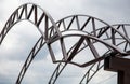 The metal frame of the canopy against the sky.