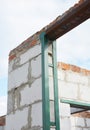 Metal frame for earthquake building protection.Earthquake-resistant structures with metal frames on entrance and window lintels. Royalty Free Stock Photo