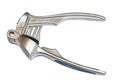 Metal garlic press isolated closeup