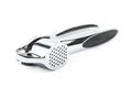 Metal garlic press utensil isolated