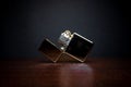 Metal gasoline lighter on black background Royalty Free Stock Photo