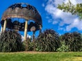 Metal gazebo structure in botanical garden Royalty Free Stock Photo