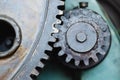 Metal gear cogwheel in steel heavy industry machine with dirty grease oil lube Royalty Free Stock Photo