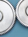 Metal gears on blue background. Royalty Free Stock Photo