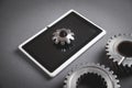 Metal gears mechanism with a digital tablet Royalty Free Stock Photo