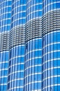 Metal glass facade blue colour of skyscraper. Fragment of the modern building. Many windows pattern Royalty Free Stock Photo