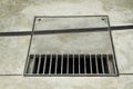 Metal grate drain Royalty Free Stock Photo