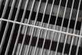 Metal grate structure of drainage waterway. Royalty Free Stock Photo