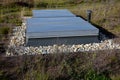 metal grates and a hatch on the roof garden.