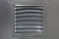 Metal grating in the door for air ventilation Royalty Free Stock Photo