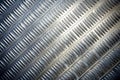 Metal grating texture with diagonal lines. Industrial background. Possible use Engineering design, construction Royalty Free Stock Photo