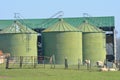 Metal green farm silos Royalty Free Stock Photo