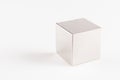 Metal grey cube on a white background