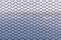 Metal grid as decorative or protective fence