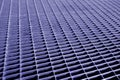 Metal grid pattern with blur effect in blue tone Royalty Free Stock Photo