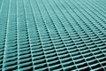 Metal grid pattern with blur effect in cyan tone Royalty Free Stock Photo