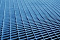 Metal grid pattern with blur effect in navy blue tone Royalty Free Stock Photo