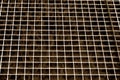 Metal grid texture in brown tone. Royalty Free Stock Photo