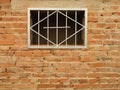 Metal grid in the window Royalty Free Stock Photo