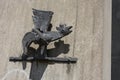 Metal griffin sculpture mounted on a wall Royalty Free Stock Photo