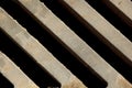 Metal grill close-up. view from above. oblique lines. background, structure. drain grate