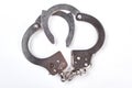 Metal handcuffs with clipping path. Royalty Free Stock Photo